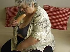 gray haired granny and her huge dildo